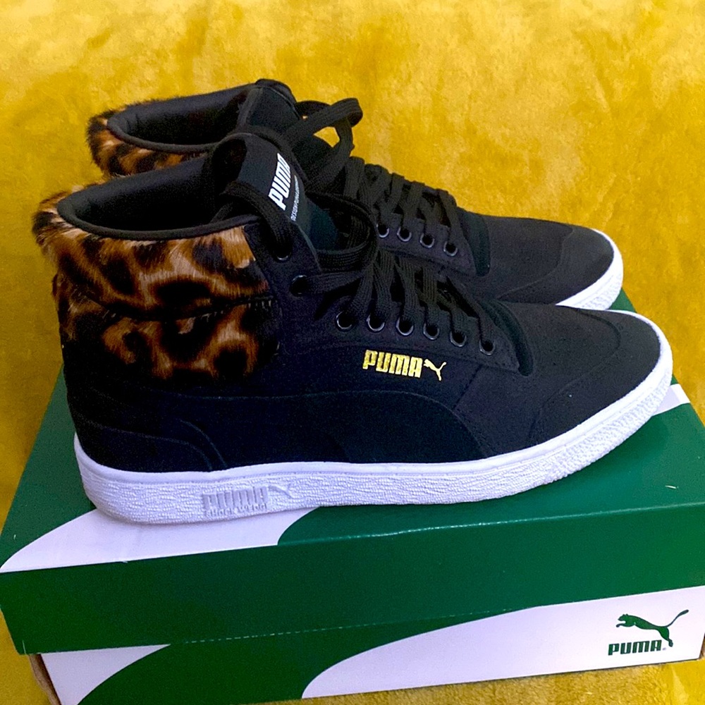 Casual athletic sneakers. Black leopard print high tops. Excellent condition.